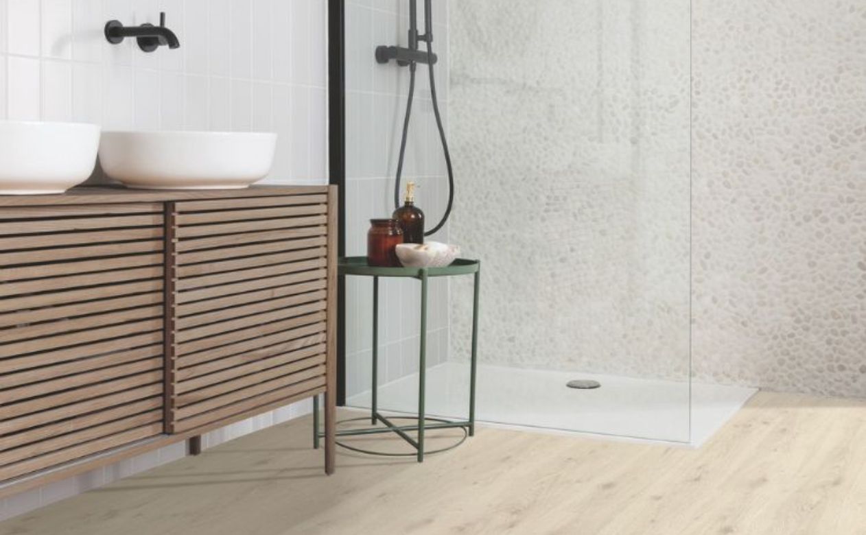 hardwood flooring and custom tile shower in Lethbridge AB in stylish bright bathroom